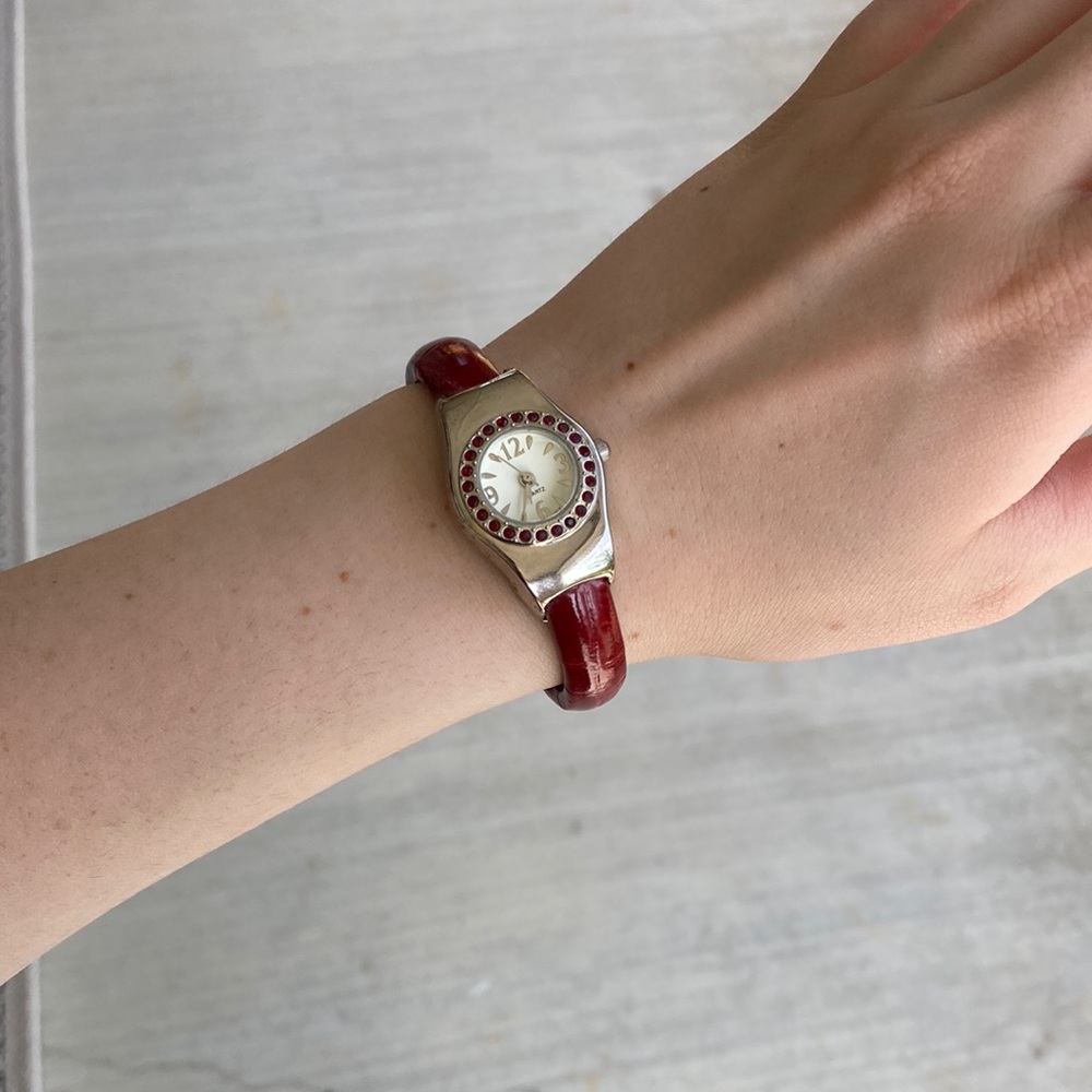 Red Hinged Avon Watch